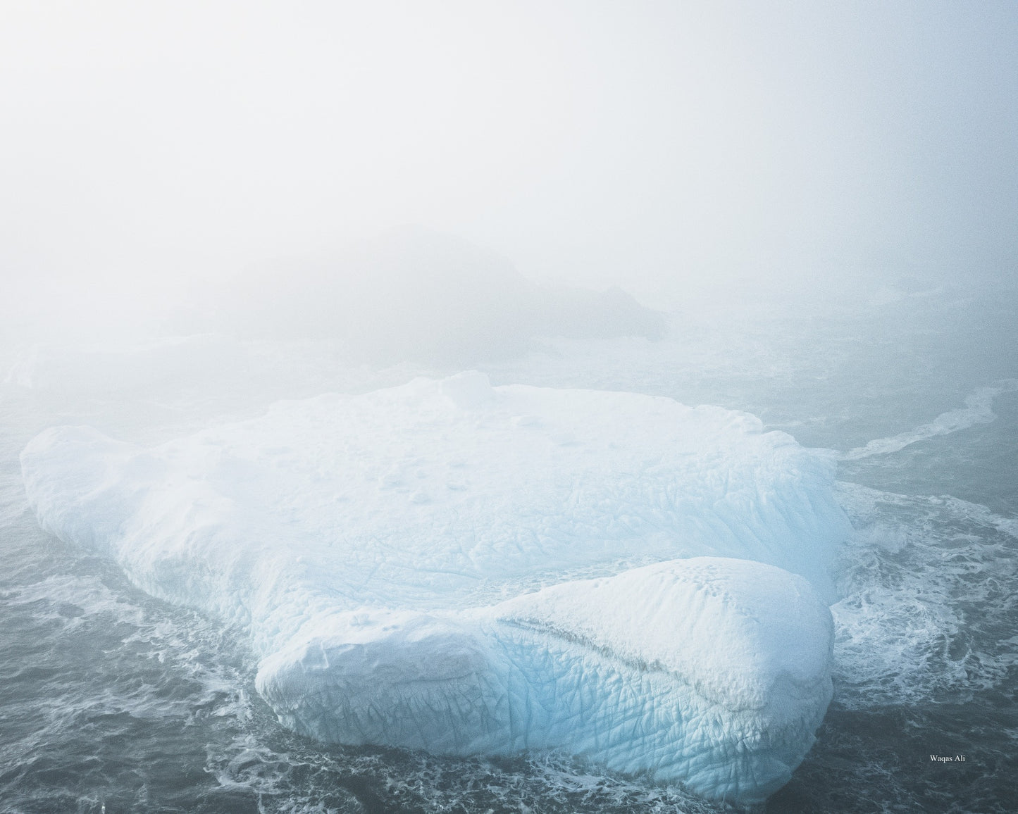 Floating beauty: a lone iceberg off Newfoundland’s rugged coast